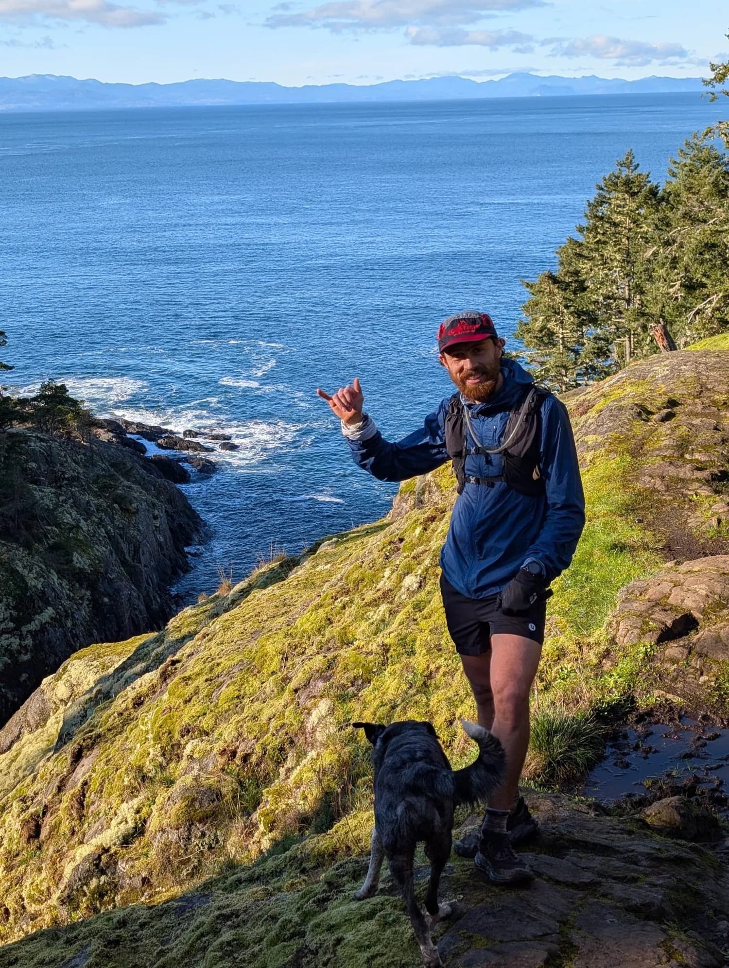 Manuel on the Juan de Fuca coast with the ocean behind him